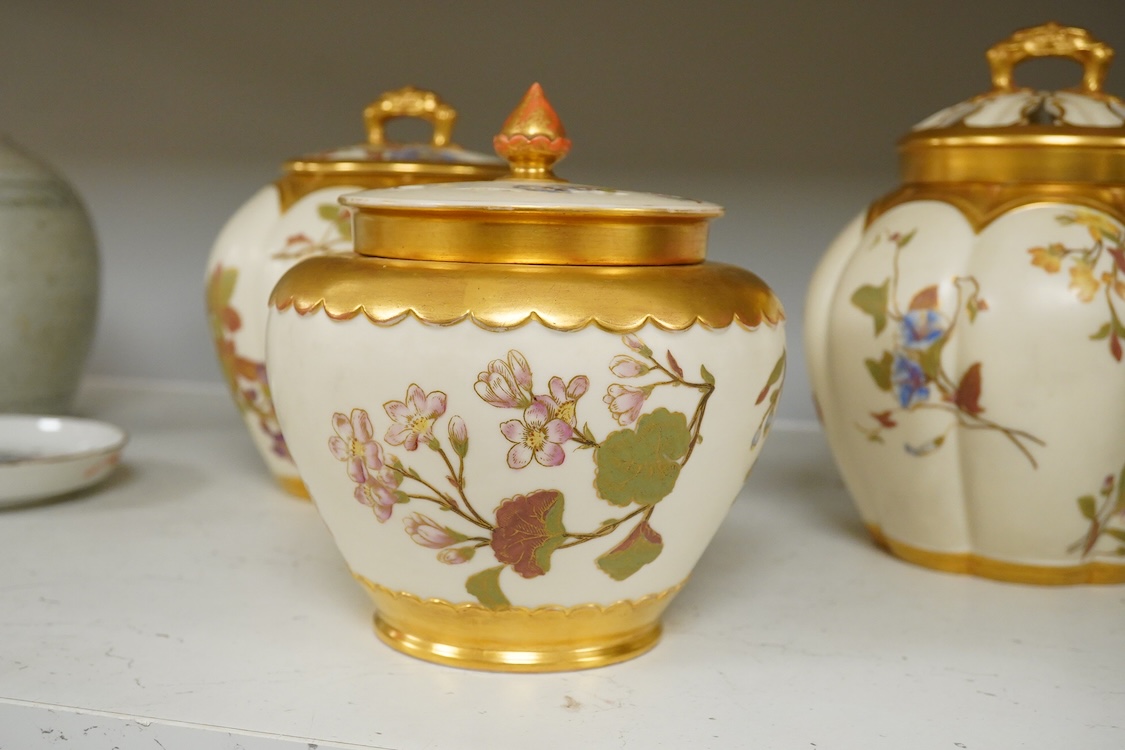 Three 19th century Worcester blush ivory potpourri or biscuit jars and covers, two with liners, each decorated with flowers and buds, largest 20cm high